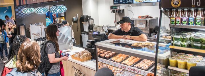 Students line up at Einstein Bros. to get bagels.